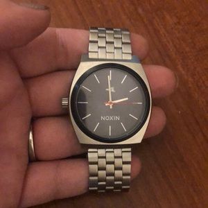 Nixon x primitive skateboarding watch.